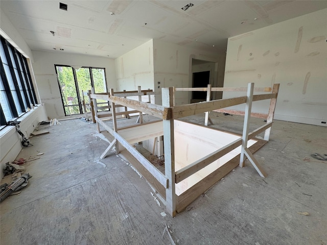 misc room with an upstairs landing