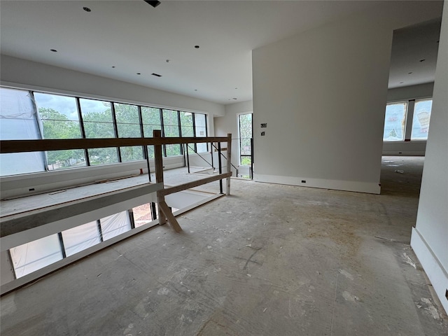 710 Glen Echo Ln, Hedwig Village, TX 77024 - empty room featuring healthy amount of natural light