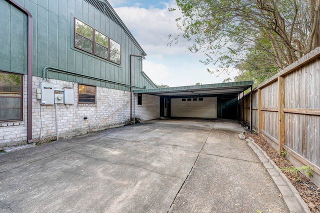 view of side of home with a garage