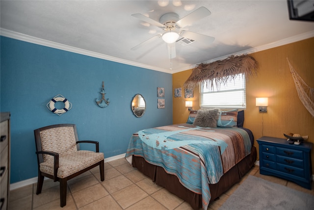 tiled bedroom with ceiling fan and ornamental molding