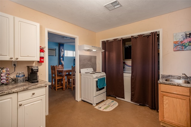 kitchen featuring white range oven, a wall mounted AC, a textured ceiling, exhaust hood, and sink