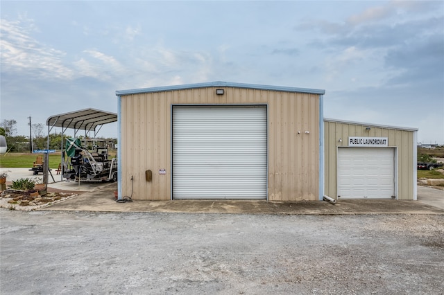 garage with a carport