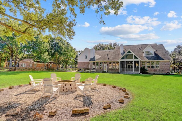 view of yard with a patio and a fire pit