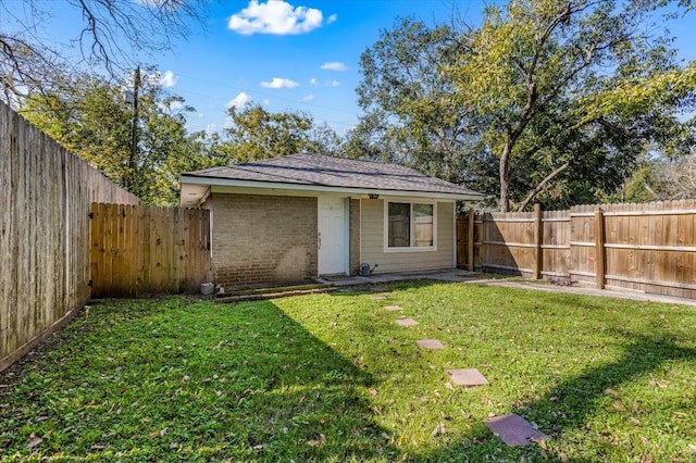 exterior space with a yard