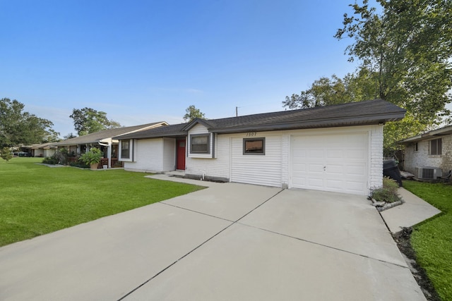 single story home featuring a front lawn, a garage, and central AC