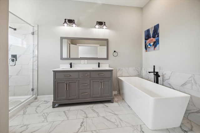 bathroom with tile walls, shower with separate bathtub, and vanity