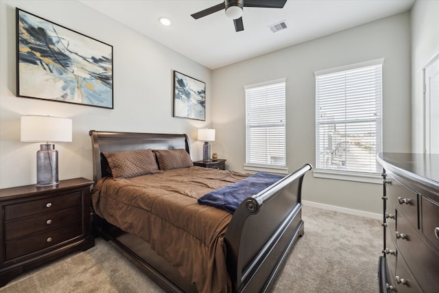 carpeted bedroom featuring ceiling fan