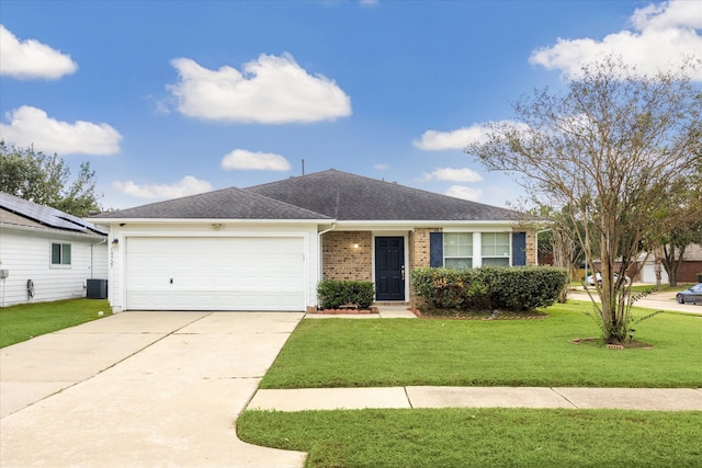 single story home featuring a front lawn, a garage, and central AC unit