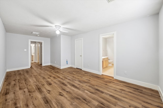 interior space featuring hardwood / wood-style flooring and ceiling fan