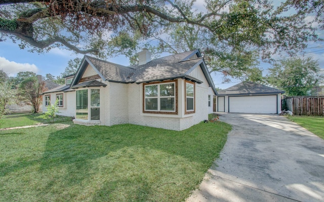 view of front facade with a garage and a front yard