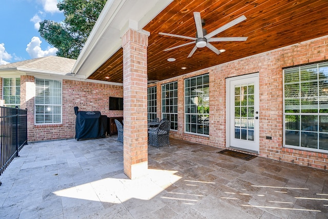 view of patio featuring ceiling fan