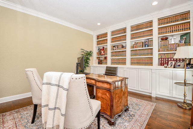 office space with bar, crown molding, and dark wood-type flooring