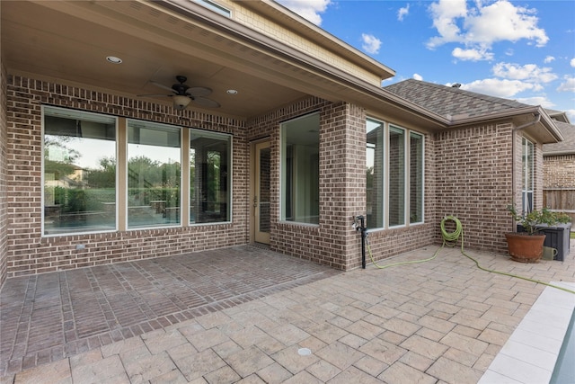 view of patio featuring ceiling fan