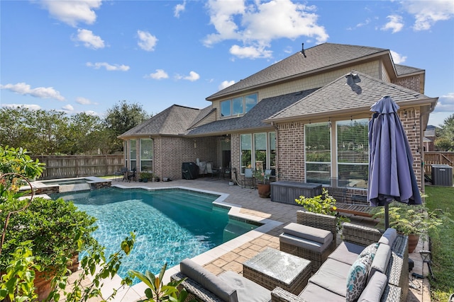 view of swimming pool featuring central air condition unit, outdoor lounge area, an in ground hot tub, and a patio