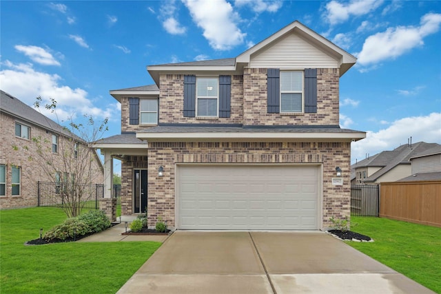 view of front facade with a garage and a front lawn