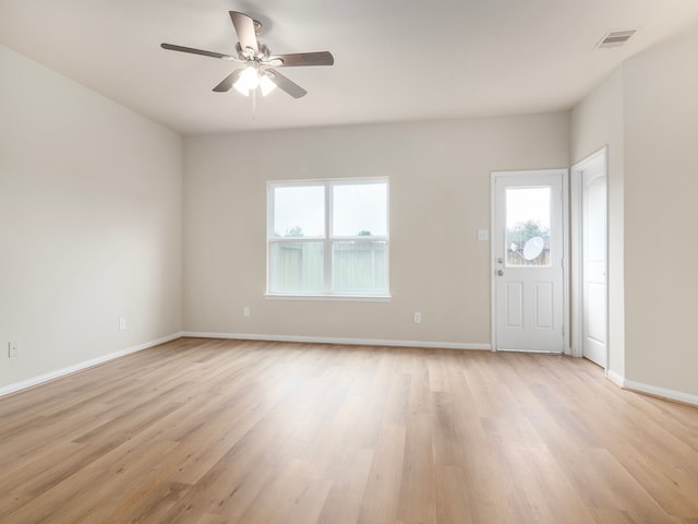 entrance foyer featuring light wood-type flooring and ceiling fan