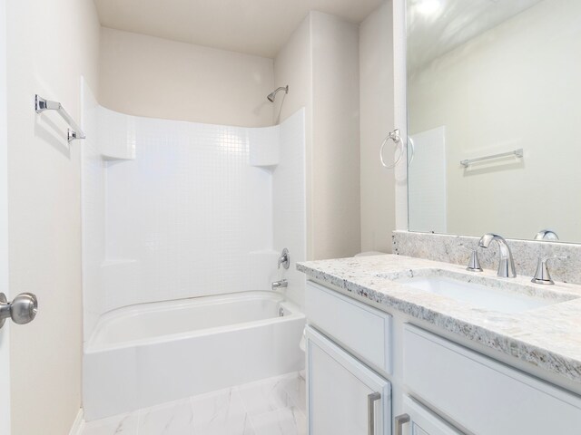 bathroom with vanity and washtub / shower combination