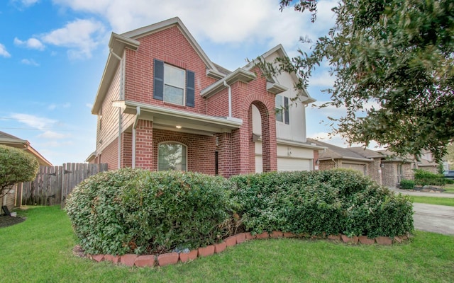 view of front of house with a garage and a front yard