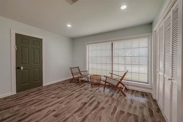 living area featuring hardwood / wood-style floors