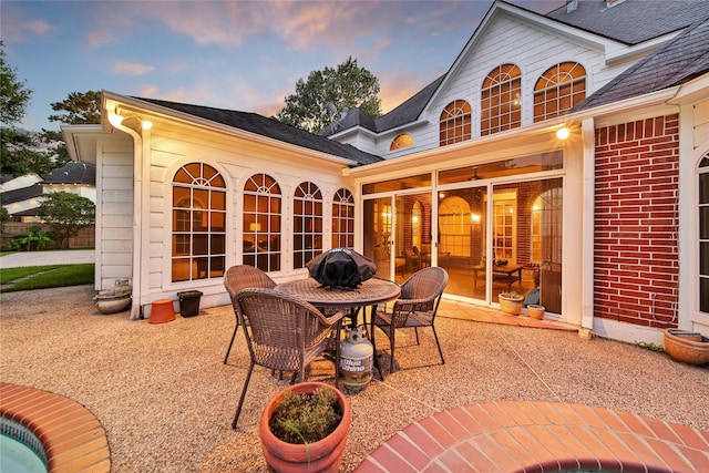 patio terrace at dusk with area for grilling