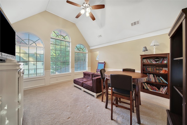 office space with lofted ceiling, light colored carpet, ceiling fan, and crown molding