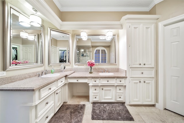 bathroom with vanity and crown molding