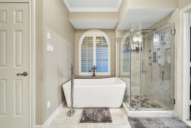 bathroom with shower with separate bathtub and ornamental molding