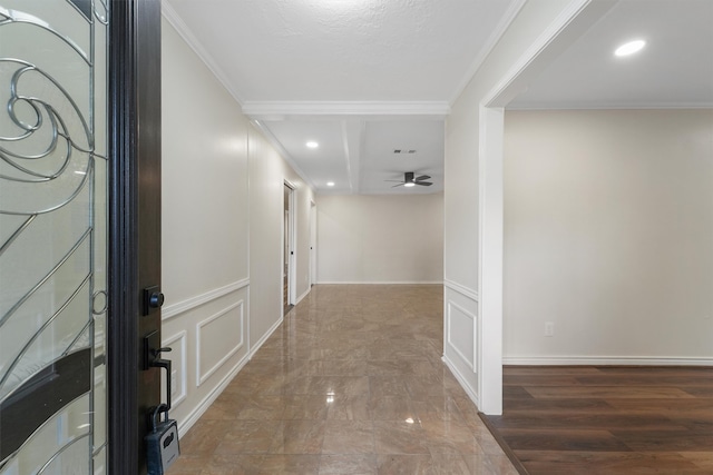 hall featuring crown molding and hardwood / wood-style floors