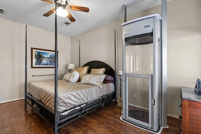 bedroom featuring dark wood-type flooring and ceiling fan