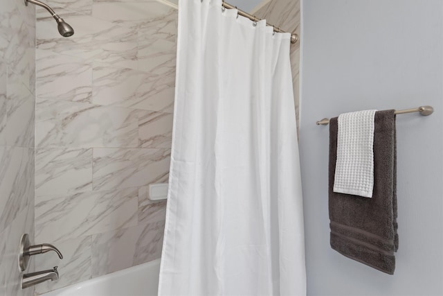 bathroom featuring shower / bath combination with curtain