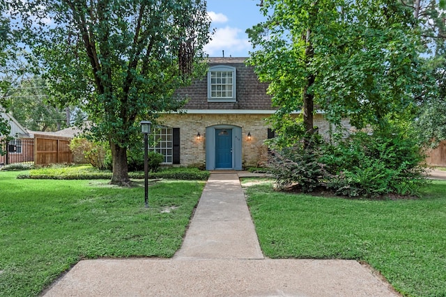 view of front of house with a front yard