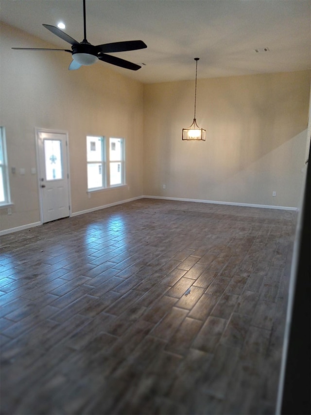 interior space featuring dark hardwood / wood-style floors and ceiling fan