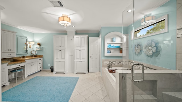 bathroom with tile patterned floors, crown molding, backsplash, vanity, and plus walk in shower