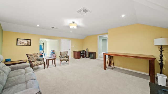 living room featuring vaulted ceiling and light carpet