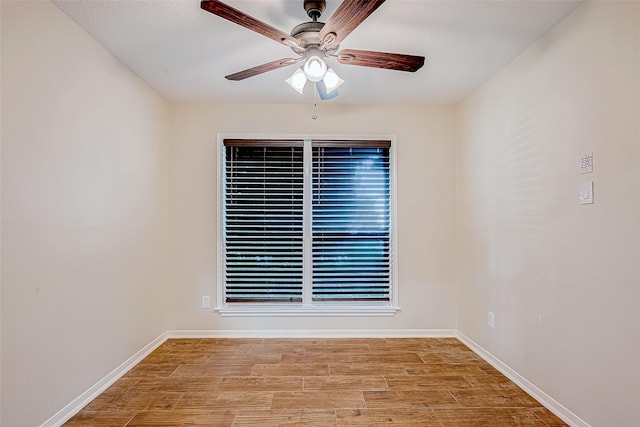 unfurnished room with light wood-type flooring and ceiling fan