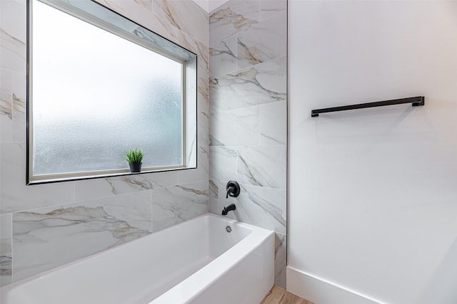 bathroom with hardwood / wood-style flooring