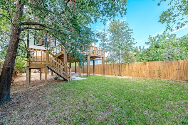 view of yard featuring a deck