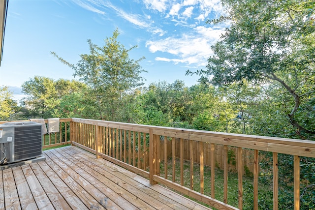 wooden deck with central AC unit