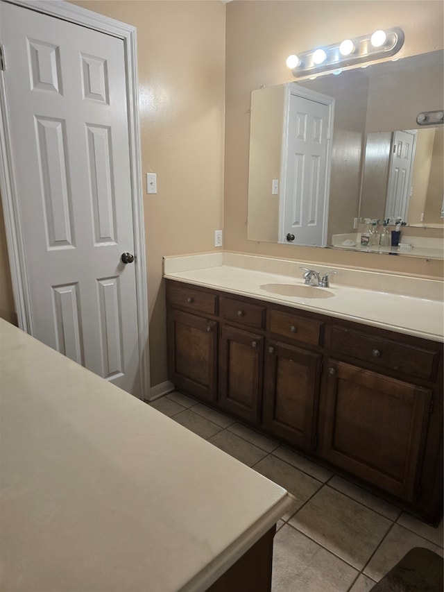 bathroom featuring vanity and tile patterned floors