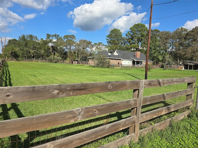 view of yard featuring a rural view