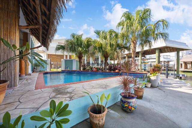 view of pool featuring a patio area