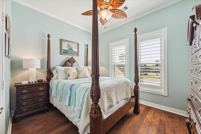 bedroom featuring ornamental molding, dark hardwood / wood-style flooring, and ceiling fan