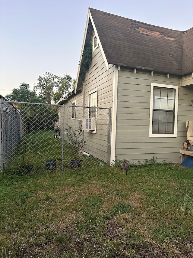 view of home's exterior featuring a lawn