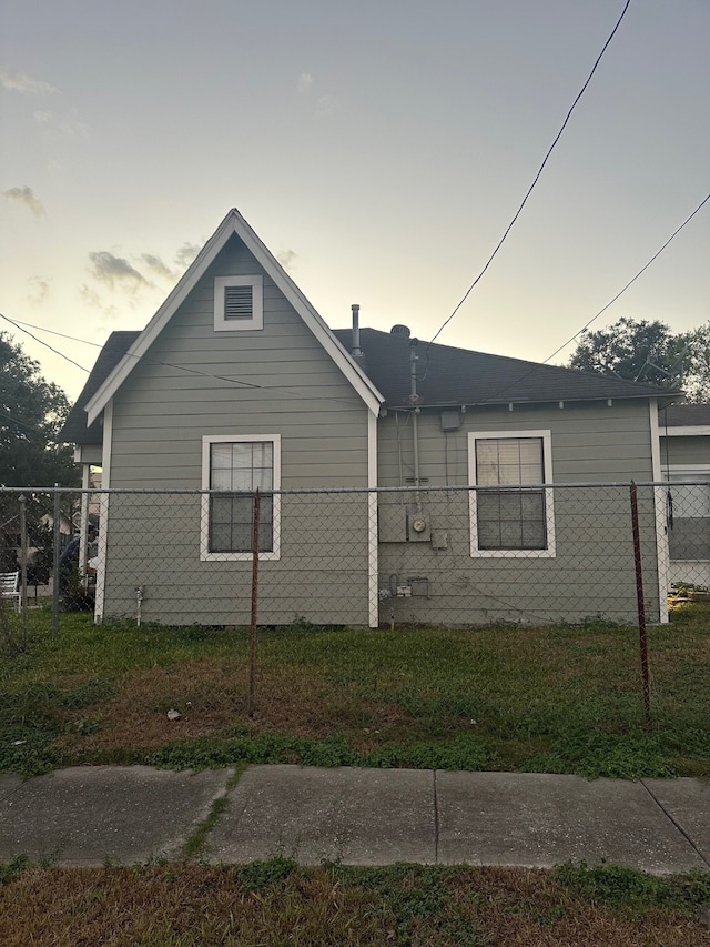 view of property exterior at dusk