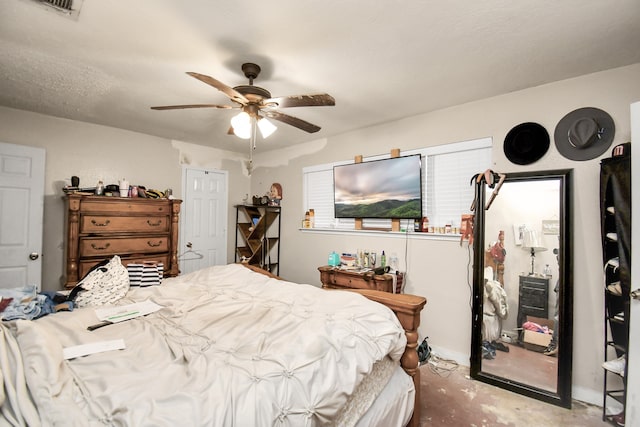 bedroom featuring ceiling fan and carpet floors