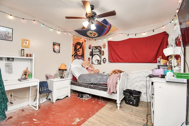 bedroom featuring wood-type flooring and ceiling fan