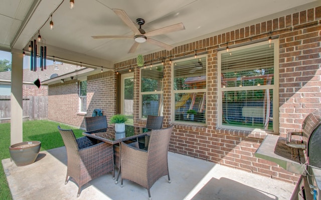 view of patio with ceiling fan