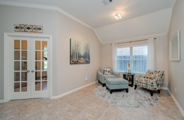 sitting room featuring french doors, lofted ceiling, light tile patterned floors, and crown molding