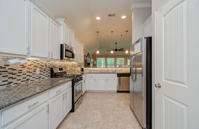 kitchen with white cabinetry, sink, crown molding, and stainless steel appliances