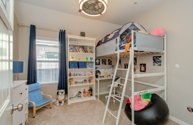 bedroom with light colored carpet